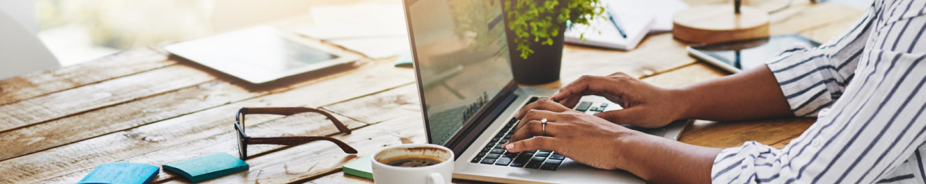 Woman typing on computer 